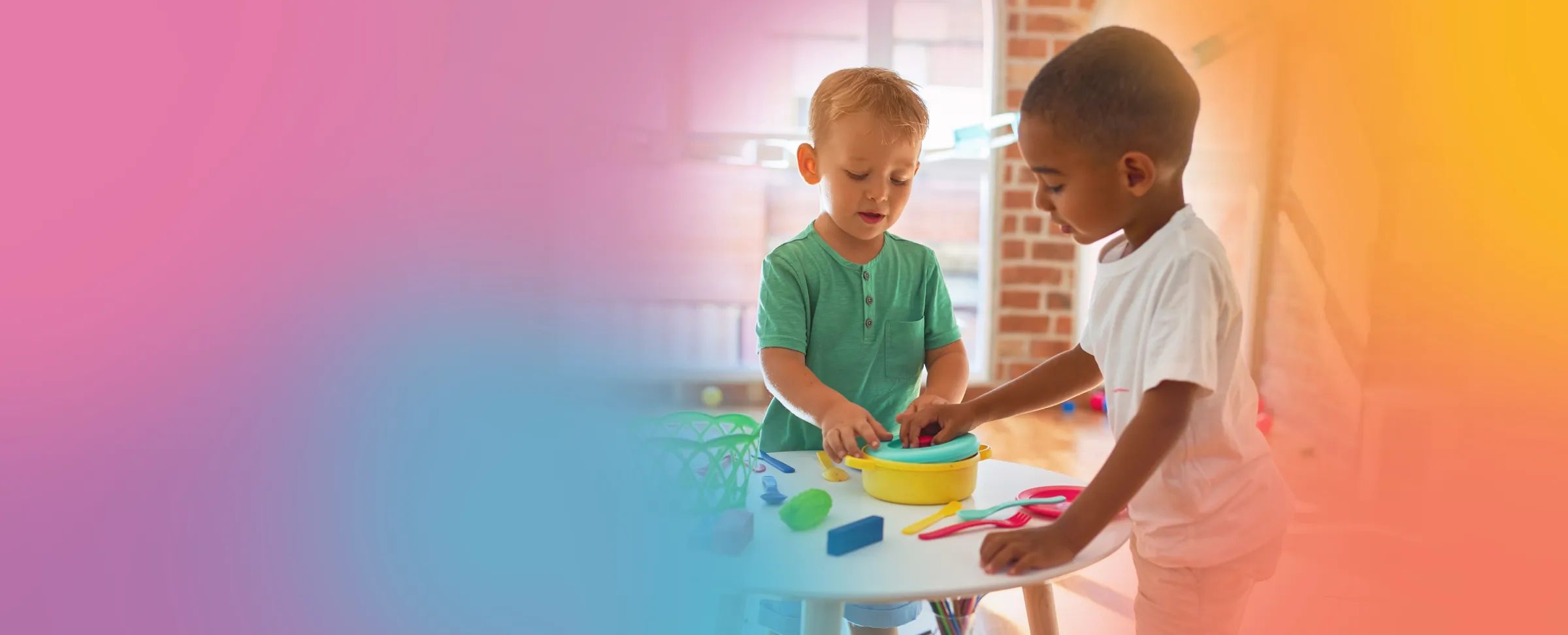 Smiling child building colorful blocks